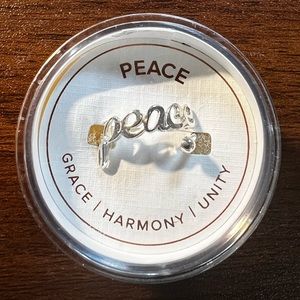 Alex and Ani adjustable “peace” ring in Sterling Silver